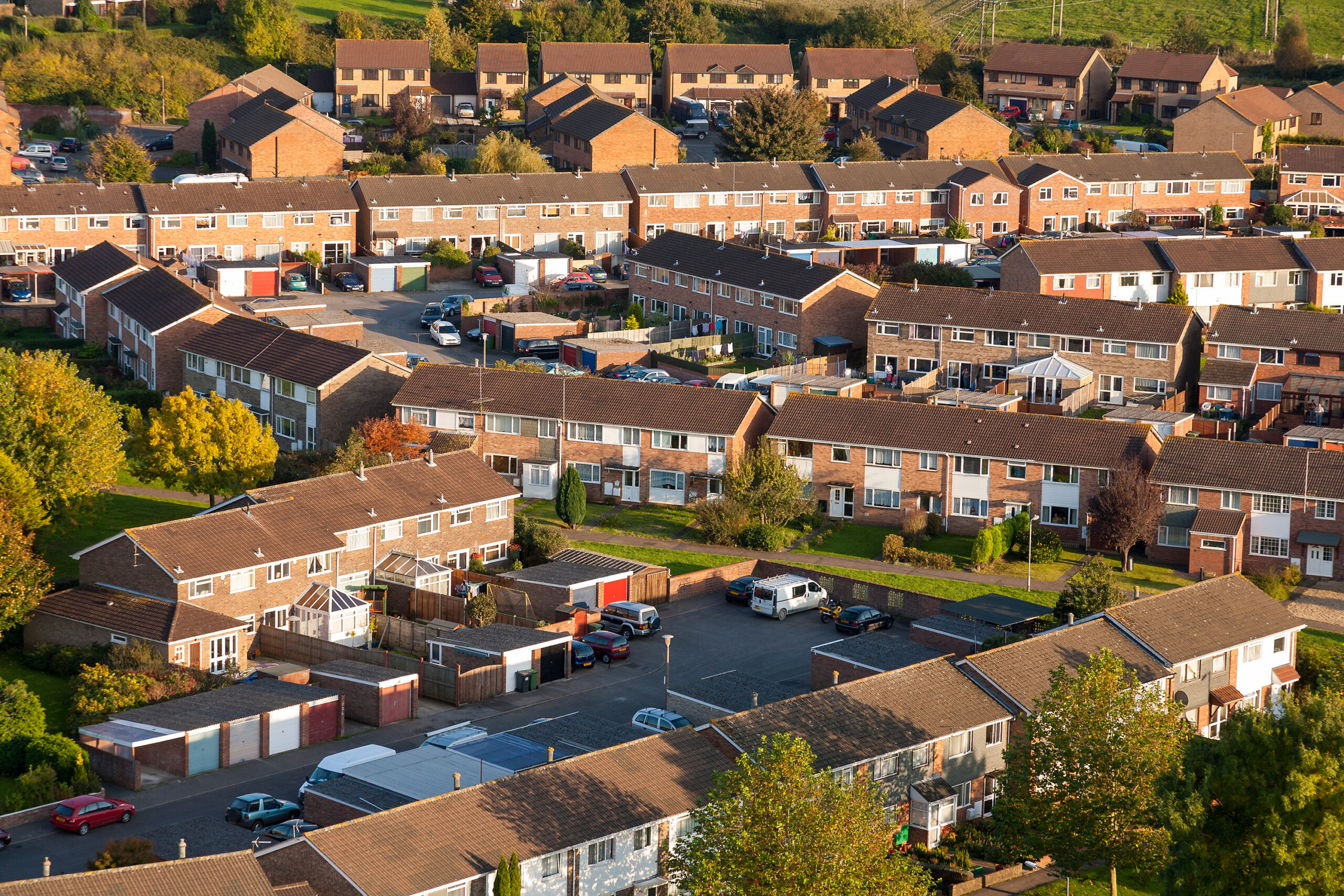 Aerial view of red brick house estate in England, UK.